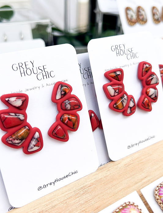 Red stones studs